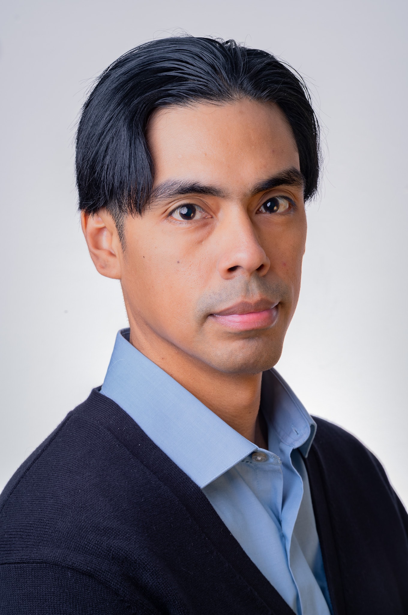 Corporate portrait, gray backdrop — Fuentes Studio NYC