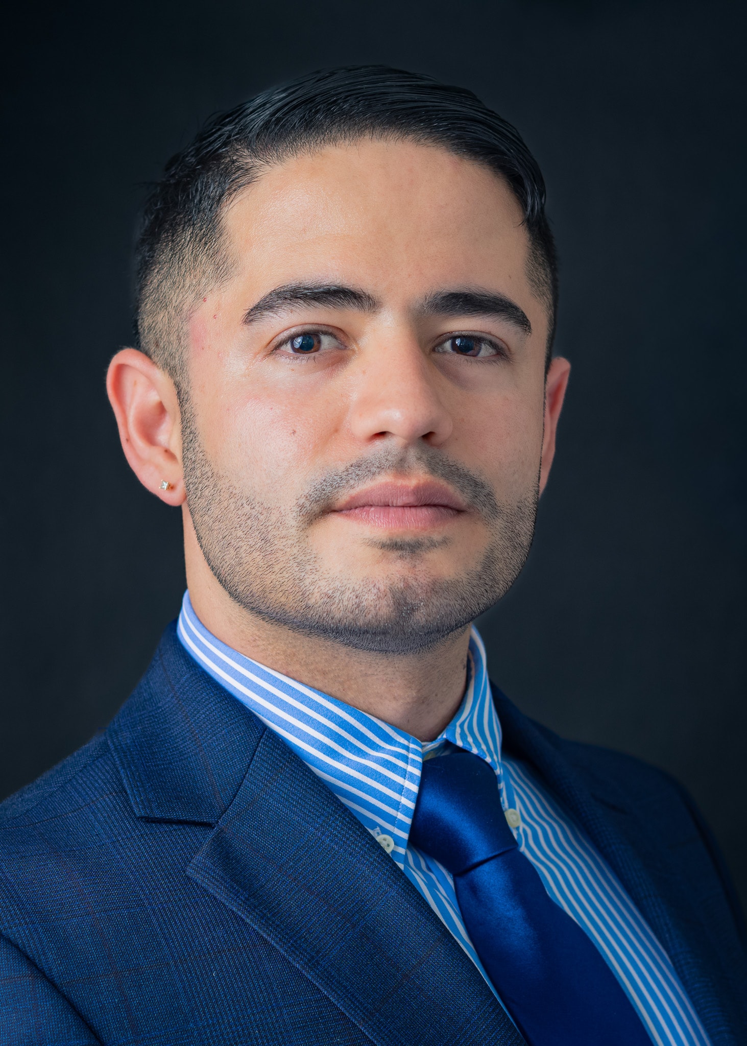 Professional corporate headshot — navy suit, NYC — Fuentes Studio